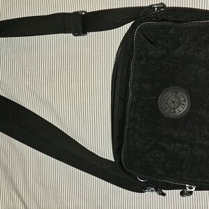 Kipling Black Crossbody Bag with Adjustable Strap and Logo